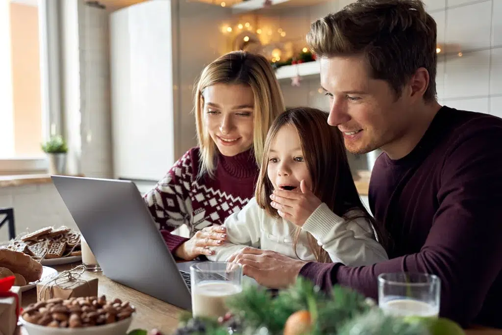 Virtual Santa Visit - Enjoy a Live Video Chat with Santa Claus! 21 A family enjoying a virtual Santa visit from the comfort of their own home