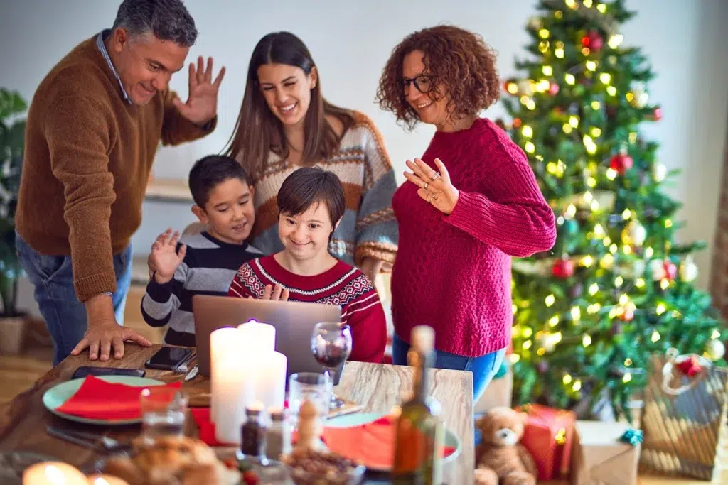 Virtual Santa Visit - Enjoy a Live Video Chat with Santa Claus! 24 A family donating to a charitable cause with the help of virtual Santa