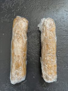 Jamaican black cake cookies, shaping the dough into a log