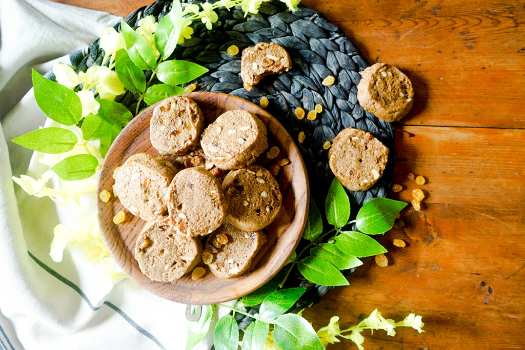 Jamaican black cake cookies dusted with powdered sugar