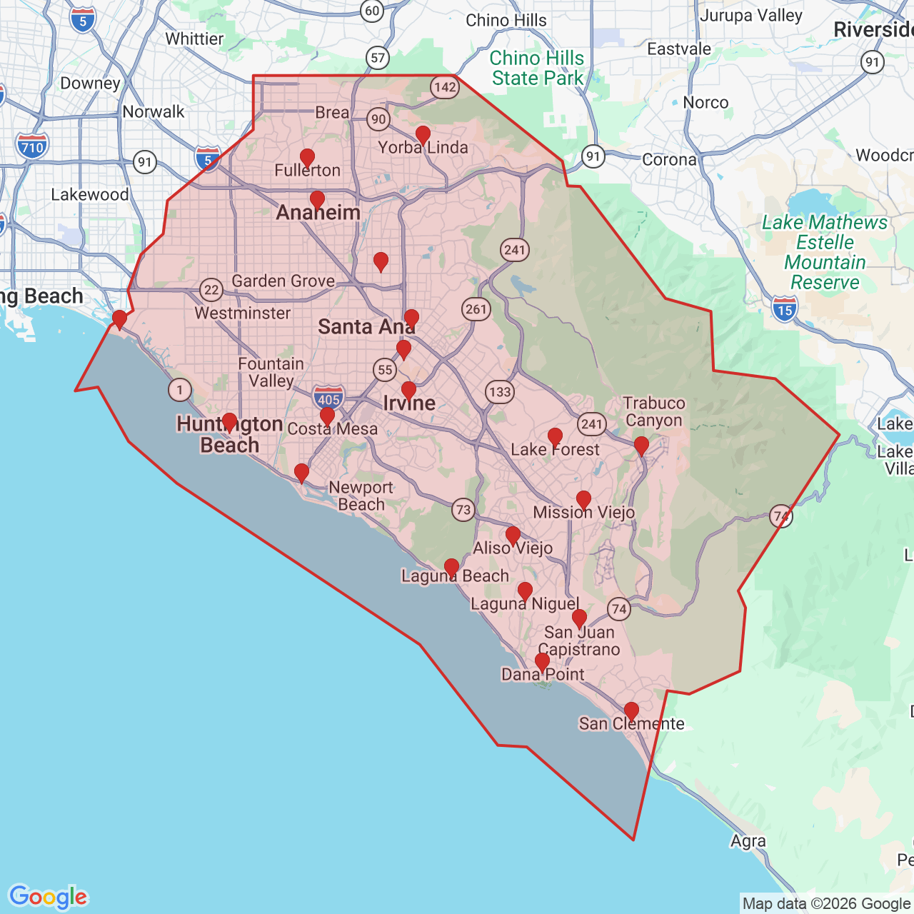 Map of House of Kringle's Santa visit service area in Orange County, with 20 city pins and the county boundary outlined in red.